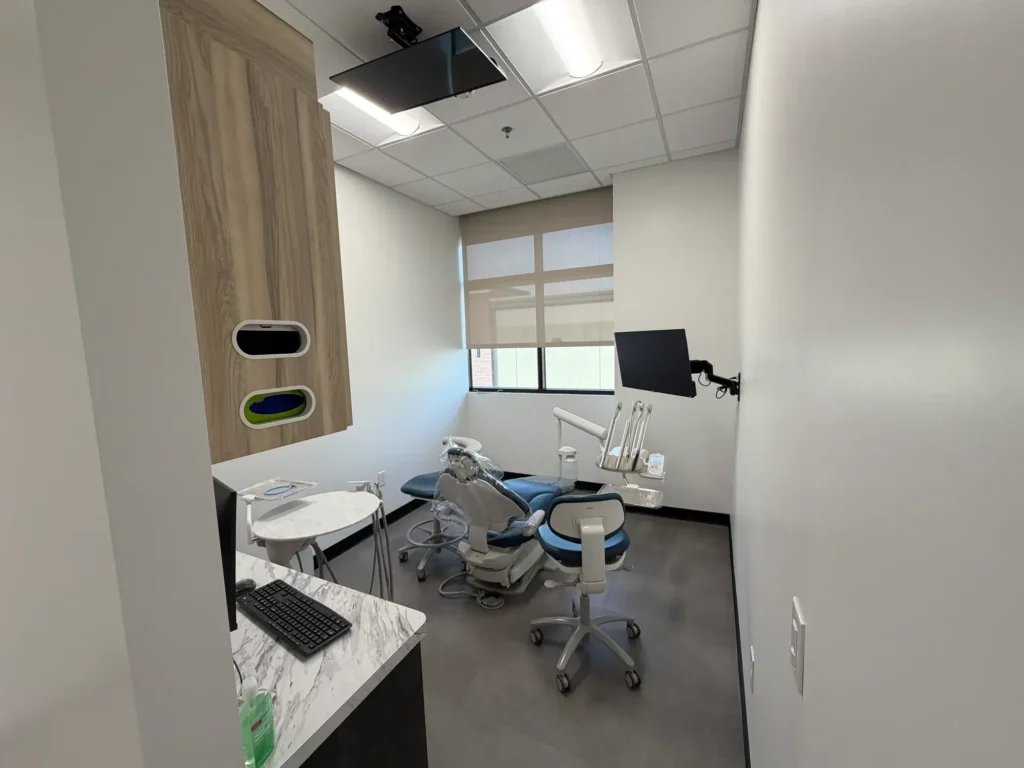 Sonoran Dental Studio treatment room with chair and dental equipment